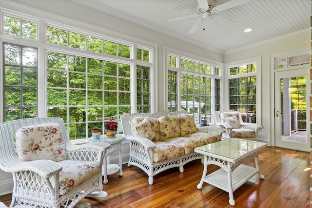 218 Pine St, Rehoboth, MA 02769 - sunroom / solarium featuring ornamental molding, wood-type flooring, and a wooden deck