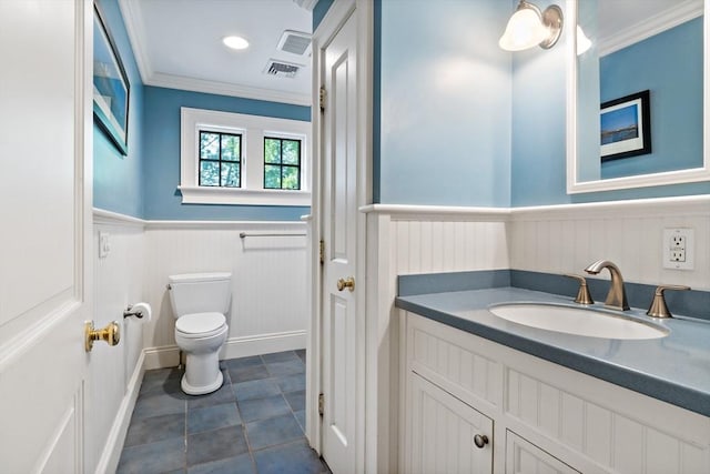 218 Pine St, Rehoboth, MA 02769 - bathroom featuring toilet, wainscoting, crown molding, vanity, and tile patterned floors