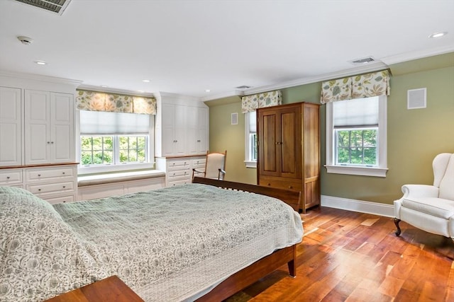 218 Pine St, Rehoboth, MA 02769 - bedroom with multiple windows, wood finished floors, ornamental molding, baseboards, and recessed lighting