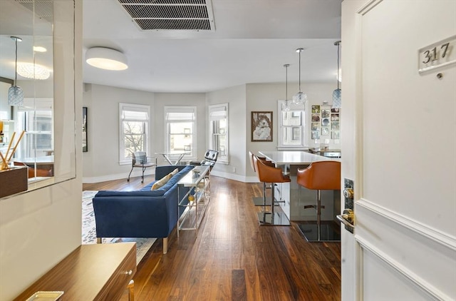 416 Commonwealth Ave Unit 317, Boston, MA 02215 - living room featuring visible vents, dark wood-style flooring, and baseboards