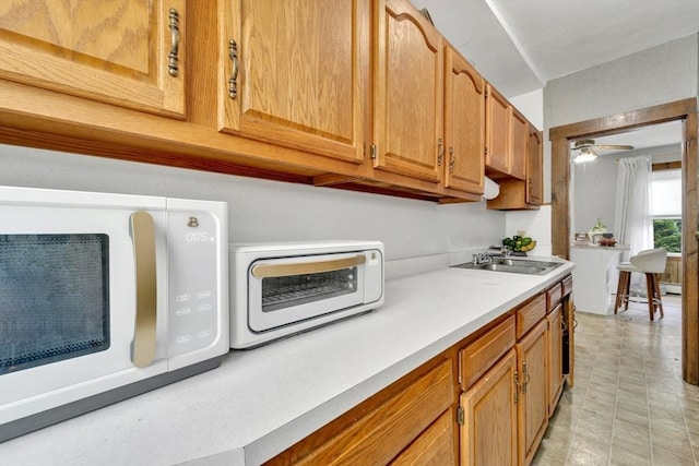 14 Halmstad, Worcester, MA 01607 - kitchen with a sink, light countertops, white microwave, and ceiling fan