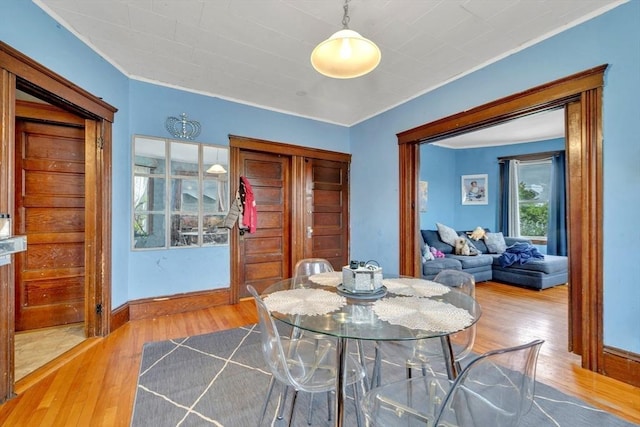 14 Halmstad, Worcester, MA 01607 - dining space with wood finished floors, baseboards, and crown molding