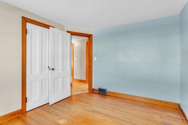 unfurnished bedroom with light hardwood / wood-style flooring