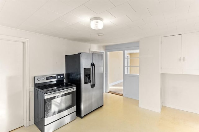 kitchen featuring white cabinets and appliances with stainless steel finishes