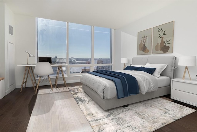 bedroom with wood finished floors
