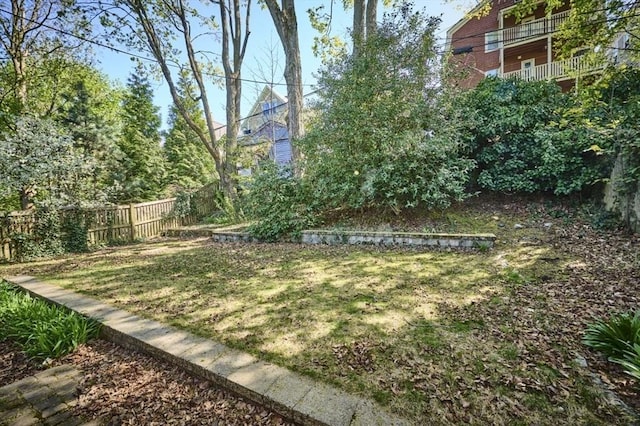 view of yard with fence