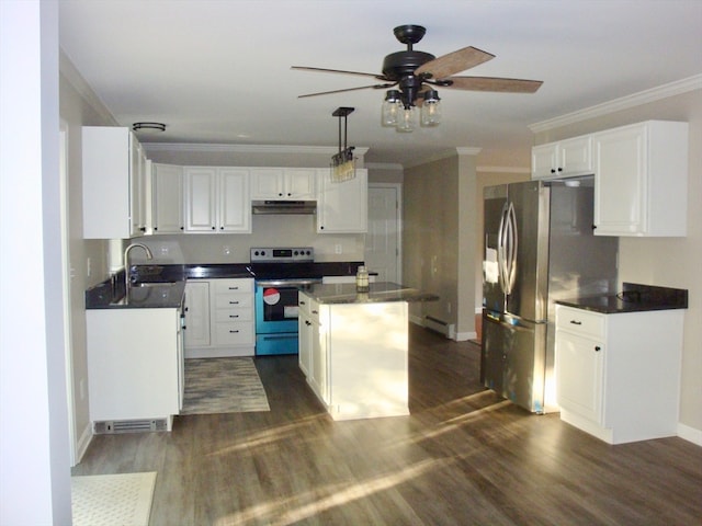 kitchen with white cabinets, dark wood-type flooring, a kitchen island, and appliances with stainless steel finishes