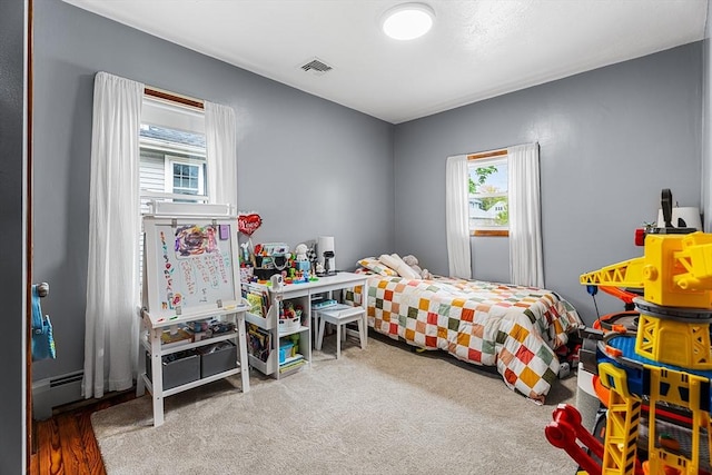 bedroom with multiple windows