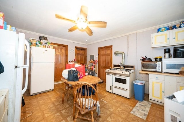6-10 Walcott St, Southbridge, MA 01550 - kitchen featuring white appliances, ceiling fan, and crown molding