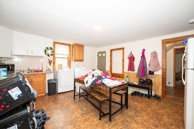 6-10 Walcott St, Southbridge, MA 01550 - bedroom featuring washer and dryer, freestanding refrigerator, and a sink