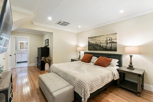 38 Rocky Hill Rd Unit B, Amesbury, MA 01913 - bedroom featuring hardwood / wood-style flooring, ornamental molding, baseboards, recessed lighting, and connected bathroom
