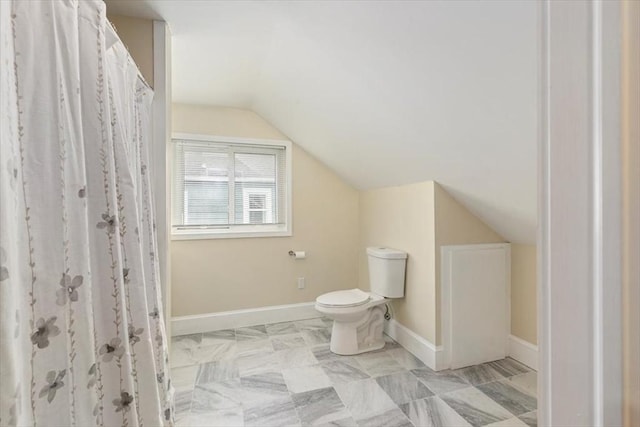 38 Rocky Hill Rd Unit B, Amesbury, MA 01913 - bathroom featuring lofted ceiling, toilet, baseboards, and a shower with curtain