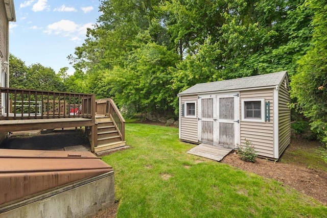 37 Railroad Ave, Whitman, MA 02382 - view of green lawn with a wooden deck