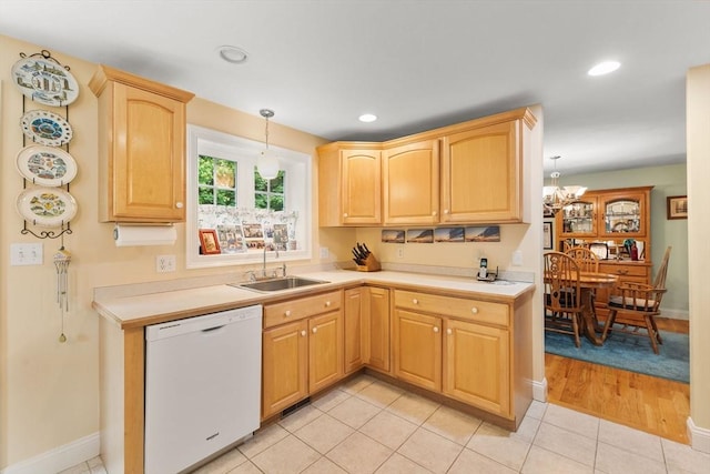 37 Railroad Ave, Whitman, MA 02382 - kitchen featuring white dishwasher, a sink, light brown cabinetry, light countertops, and recessed lighting