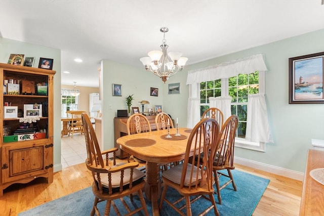 37 Railroad Ave, Whitman, MA 02382 - dining room with a chandelier, light wood finished floors, baseboards, and recessed lighting