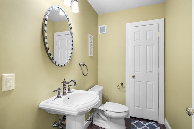 3 Emerson Way, Hopkinton, MA 01748 - bathroom featuring toilet, baseboards, and a sink