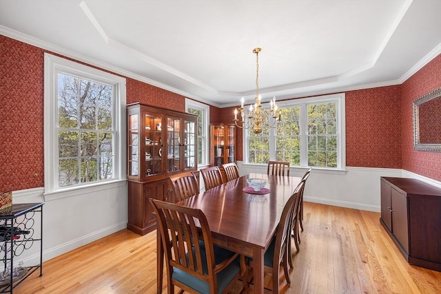 3 Emerson Way, Hopkinton, MA 01748 - dining area with wallpapered walls, a chandelier, a raised ceiling, light wood finished floors, and plenty of natural light