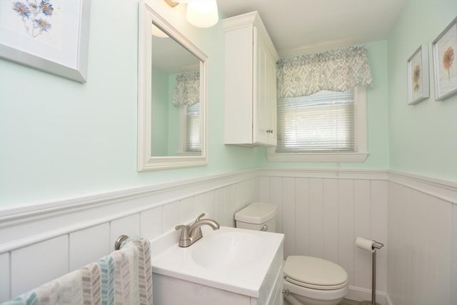 13 N Grove St, Foxboro, MA 02035 - bathroom featuring wainscoting and vanity