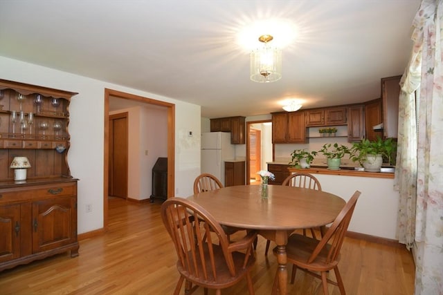 13 N Grove St, Foxboro, MA 02035 - dining area featuring light wood finished floors and baseboards