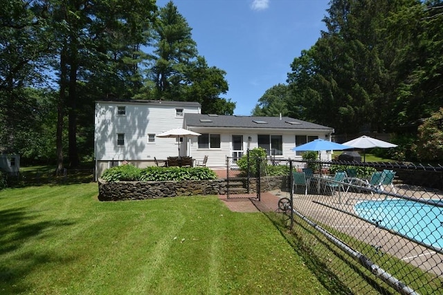 13 N Grove St, Foxboro, MA 02035 - rear view of property featuring a patio area
