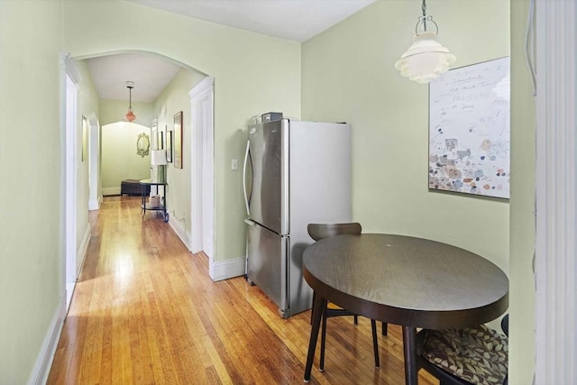 dining area with light hardwood / wood-style floors