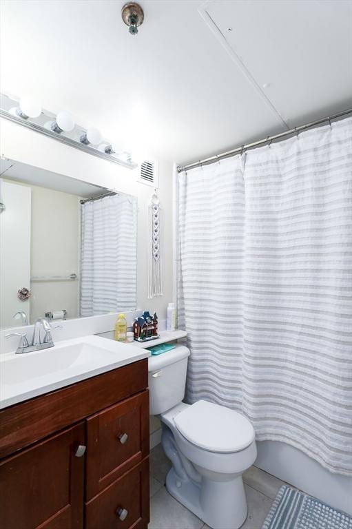 full bath with toilet, tile patterned floors, visible vents, and vanity