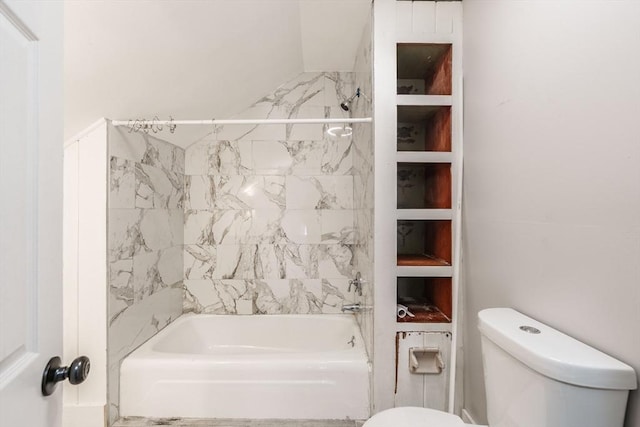 bathroom featuring toilet and shower / washtub combination