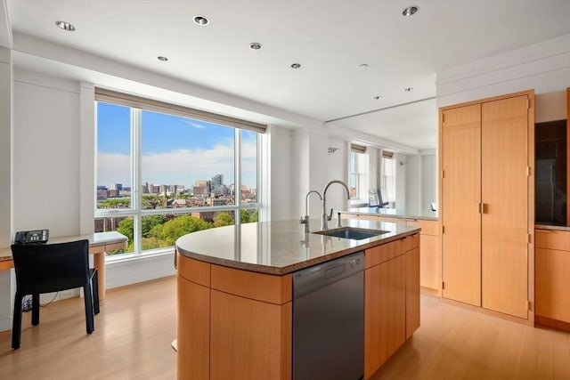 2 Commonwealth Ave Unit 15Bc, Boston, MA 02116 - kitchen featuring stainless steel dishwasher, a sink, light wood-style flooring, stone countertops, and recessed lighting