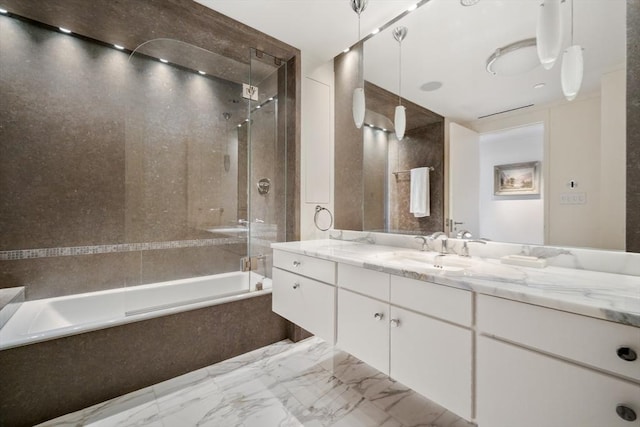 2 Commonwealth Ave Unit 15Bc, Boston, MA 02116 - bathroom featuring marble tiled floors, tiled shower / bath combo, and vanity