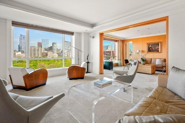 2 Commonwealth Ave Unit 15Bc, Boston, MA 02116 - living room with a view of skyline, healthy amount of natural light, and carpet flooring