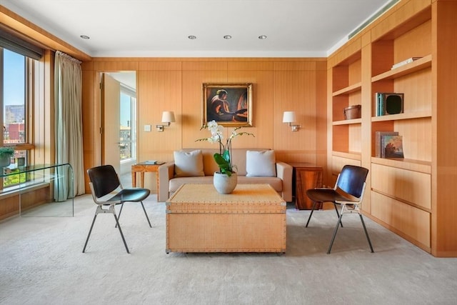 2 Commonwealth Ave Unit 15Bc, Boston, MA 02116 - living area with light carpet, healthy amount of natural light, and built in shelves