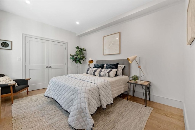 bedroom with light hardwood / wood-style floors