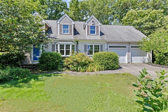 6 Kendall Vlg Unit 6, Cohasset, MA 02025 - new england style home featuring a garage, asphalt driveway, and a front lawn