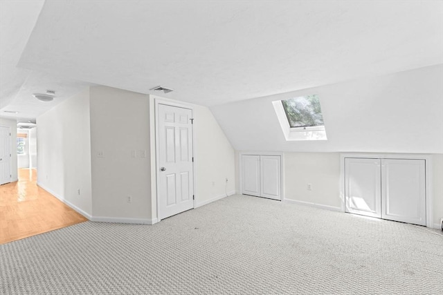 6 Kendall Vlg Unit 6, Cohasset, MA 02025 - bonus room featuring light carpet, a skylight, and vaulted ceiling