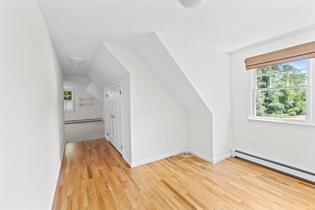 6 Kendall Vlg Unit 6, Cohasset, MA 02025 - bonus room featuring a baseboard heating unit, light wood-style floors, and plenty of natural light