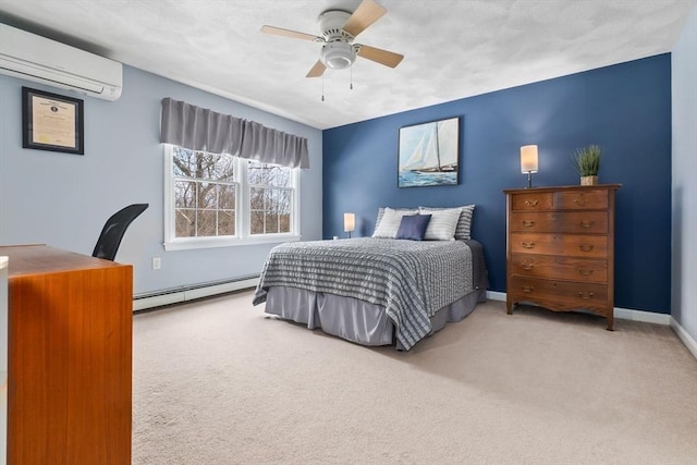 bedroom with carpet floors, a baseboard radiator, a wall mounted AC, a ceiling fan, and baseboards