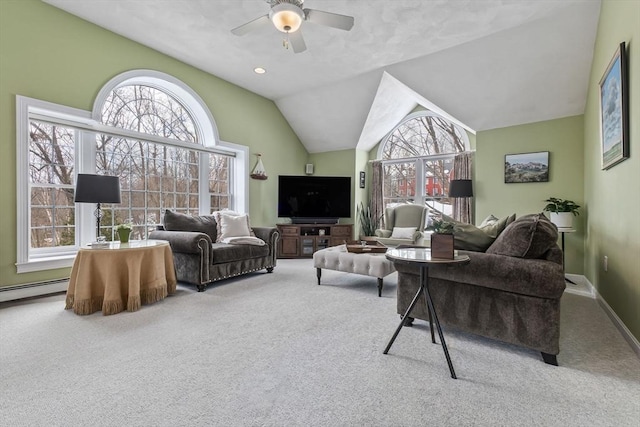 carpeted living area with recessed lighting, vaulted ceiling, baseboards, and ceiling fan