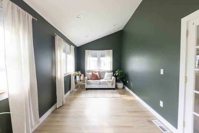 99 Dartmouth St, Westfield, MA 01085 - living area featuring lofted ceiling, light wood-style floors, and baseboards