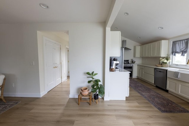 99 Dartmouth St, Westfield, MA 01085 - kitchen with dishwashing machine, wall chimney exhaust hood, gas stove, lofted ceiling, and light wood finished floors