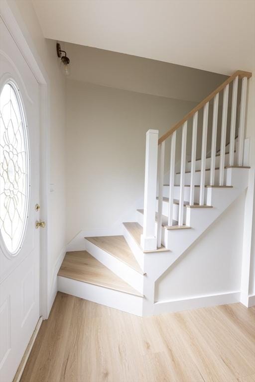 99 Dartmouth St, Westfield, MA 01085 - foyer entrance featuring wood finished floors, stairway, and baseboards