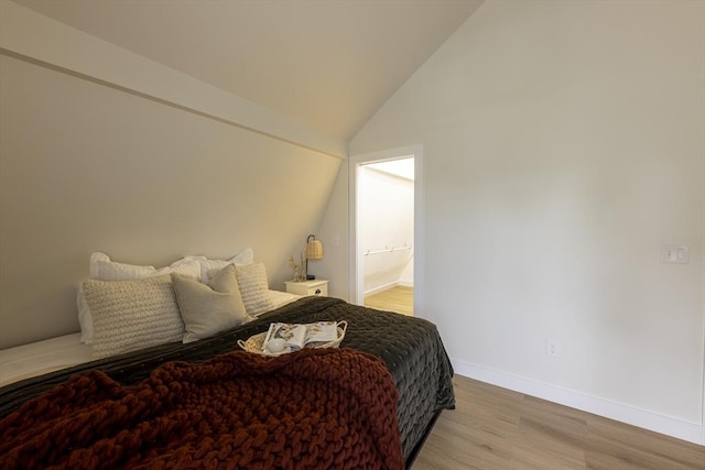 99 Dartmouth St, Westfield, MA 01085 - bedroom with lofted ceiling, baseboards, and light wood-style floors