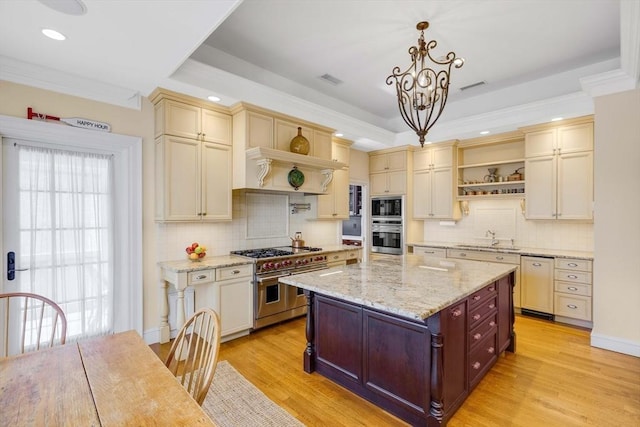 26 Winter St, Salem, MA 01970 - kitchen with appliances with stainless steel finishes, open shelves, light wood-style floors, tasteful backsplash, and recessed lighting