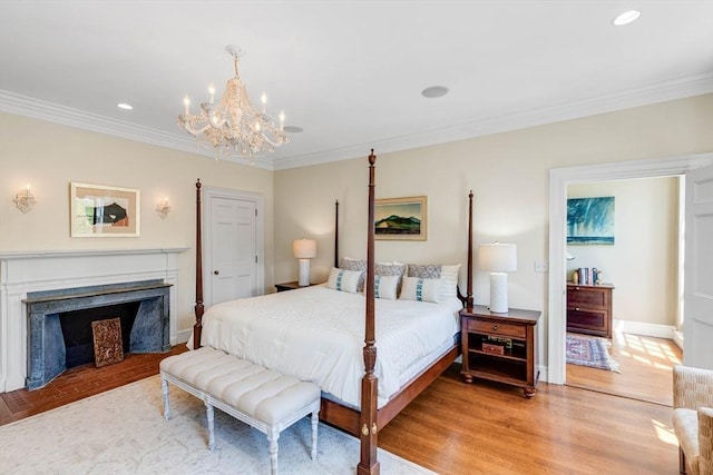 26 Winter St, Salem, MA 01970 - bedroom with ornamental molding, a chandelier, light wood finished floors, recessed lighting, and baseboards