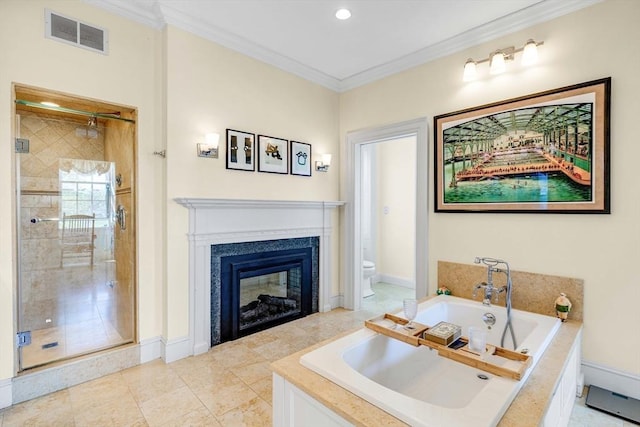 26 Winter St, Salem, MA 01970 - full bathroom featuring a garden tub, a shower stall, toilet, crown molding, and baseboards