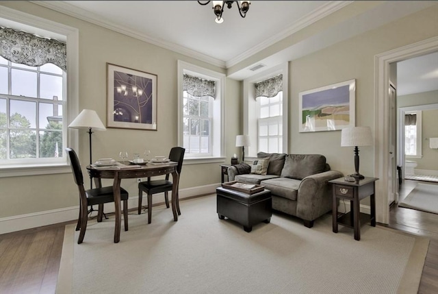 26 Winter St, Salem, MA 01970 - living room featuring plenty of natural light, wood finished floors, and ornamental molding