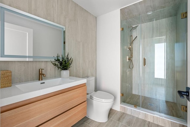 125 Lowell St Unit 3A, Somerville, MA 02143 - full bathroom with vanity, toilet, tile patterned flooring, and a shower stall