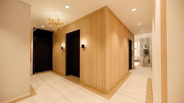 125 Lowell St Unit 3A, Somerville, MA 02143 - hallway featuring a notable chandelier, elevator, and recessed lighting