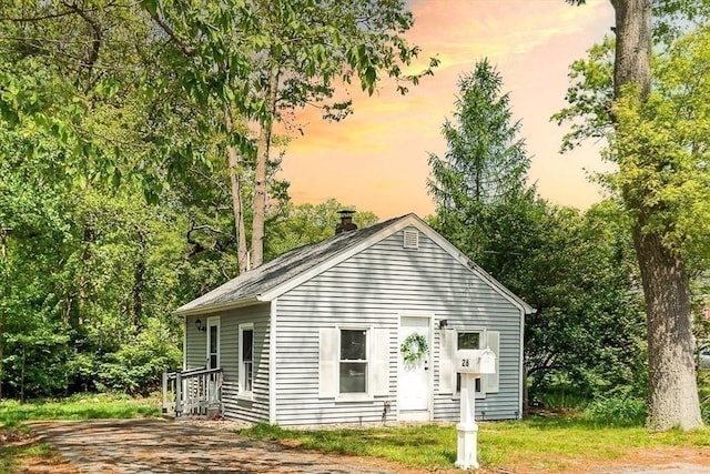 view of front of property with a chimney