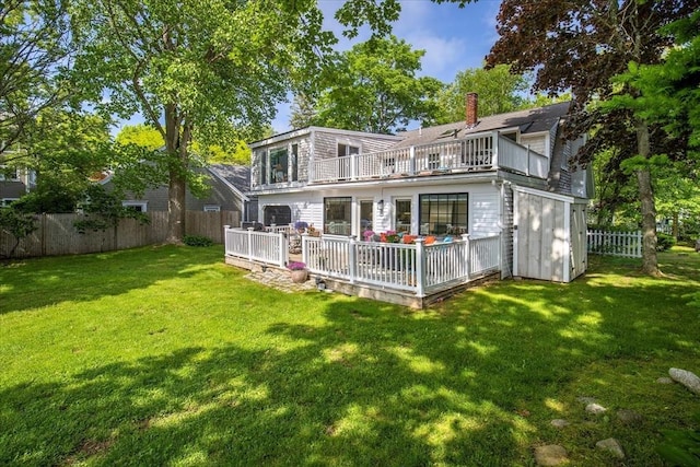 117 Parker Rd, Barnstable, MA 02655 - rear view of property featuring a balcony, a chimney, and a wooden deck