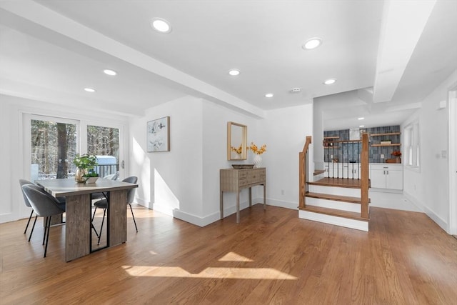 dining space with light wood-type flooring